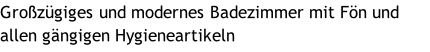 Großzügiges und modernes Badezimmer mit Fön und allen gängigen Hygieneartikeln